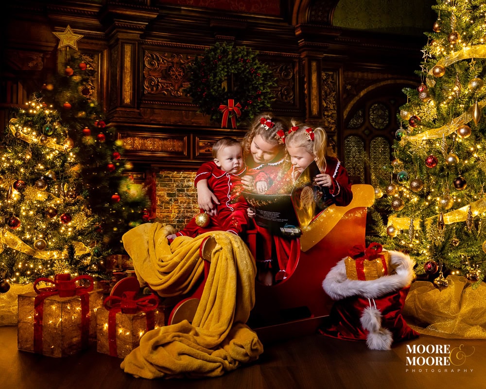A Country House Christmas Portrait Traditional, nostalgic, children's christmas photoshoot, santas sleigh and country house styling